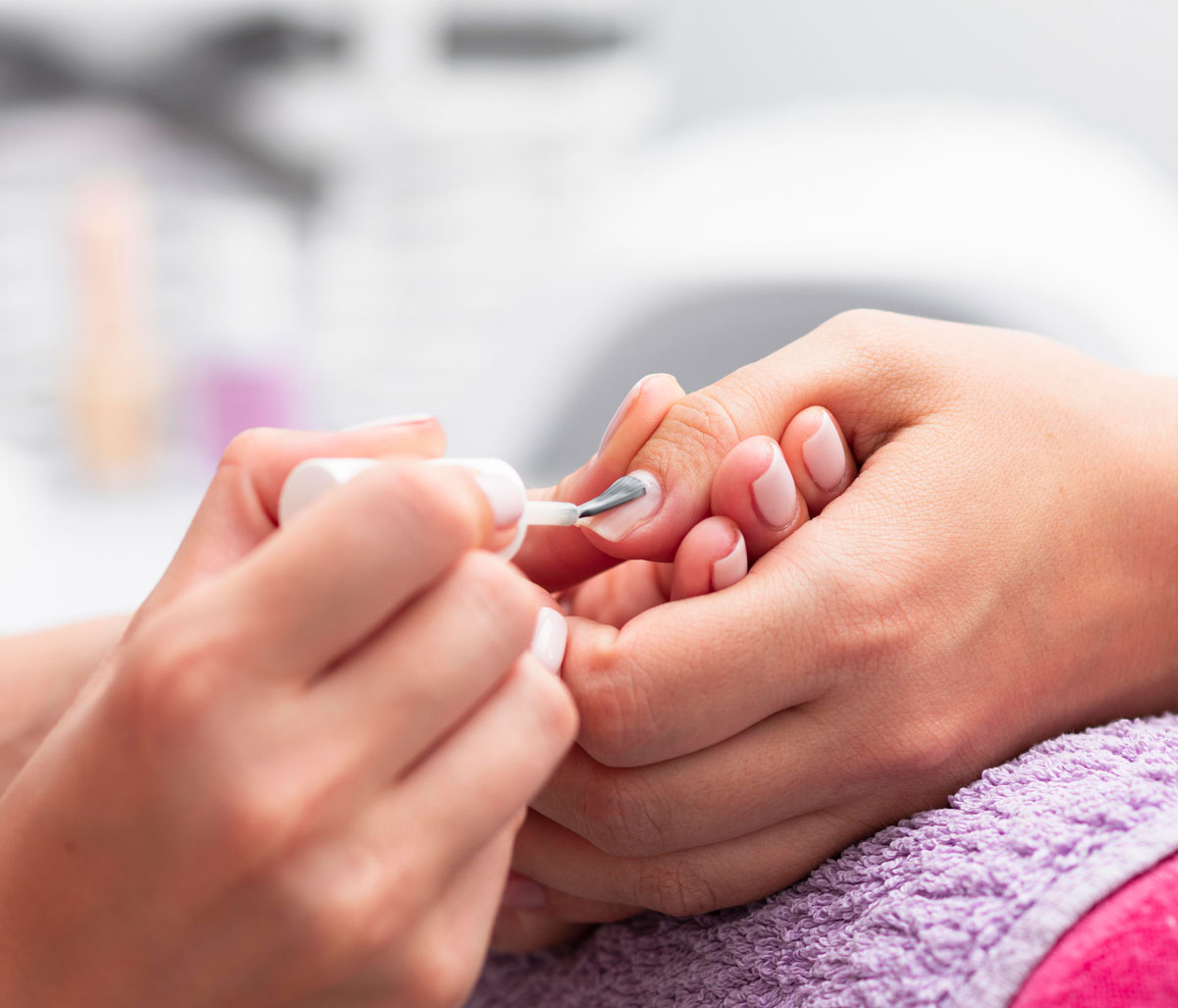 woman-having-her-manicure-about